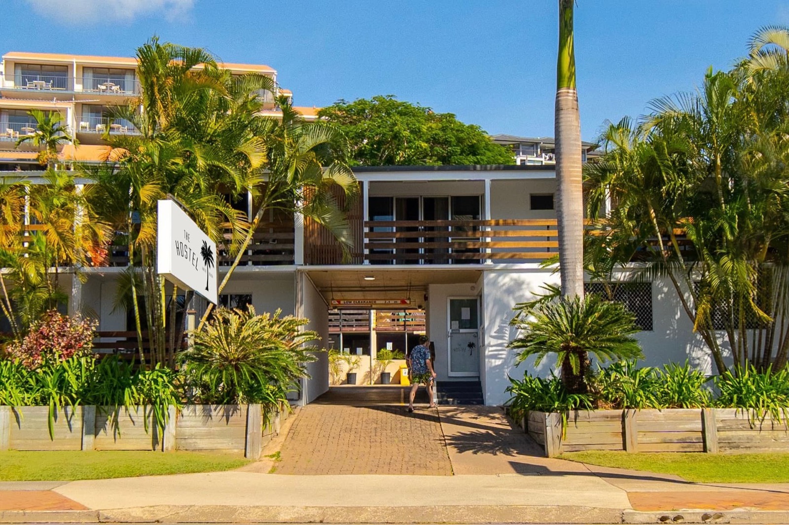 Pool and tropical gardens at The Hostel Airlie Beach